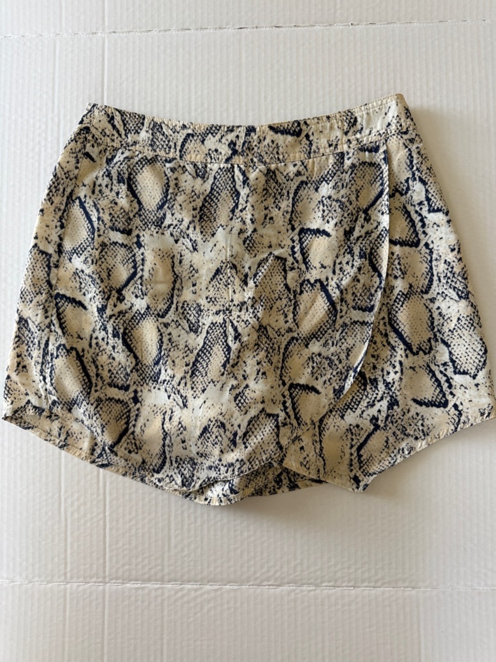 Wild Honey Black and Beige snakeskin print flutter lined skort